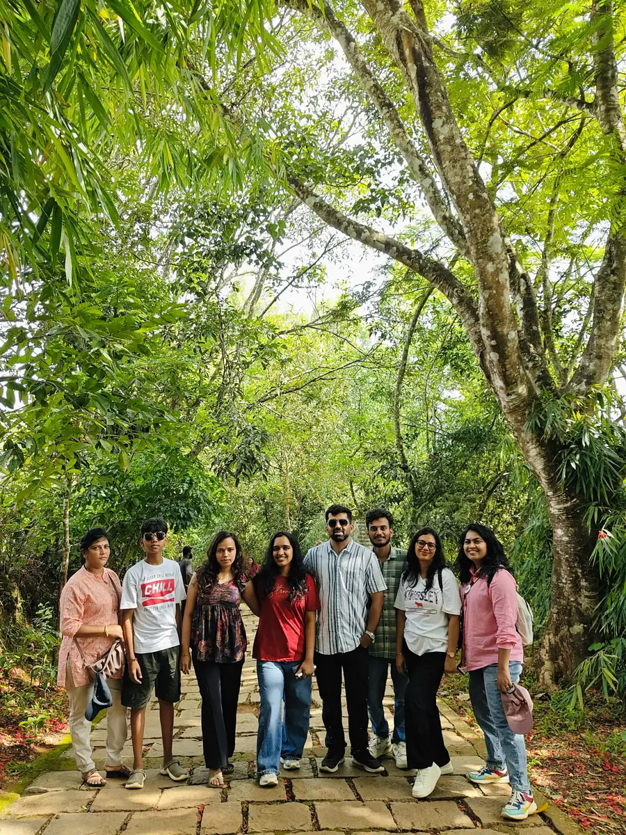 Reena with her travel group on a forest trail in Wayanad